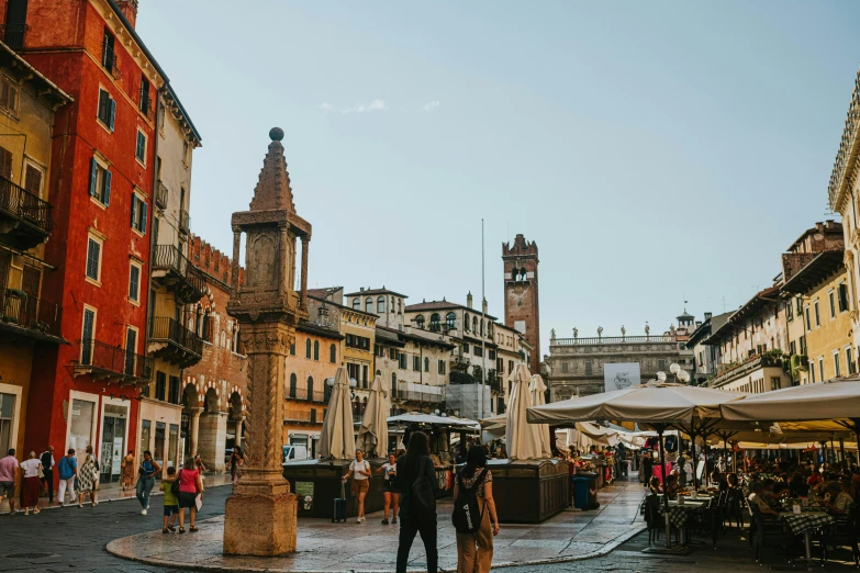 a couple stands on a busy street corner