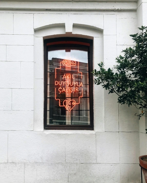 a sign in the window of a restaurant