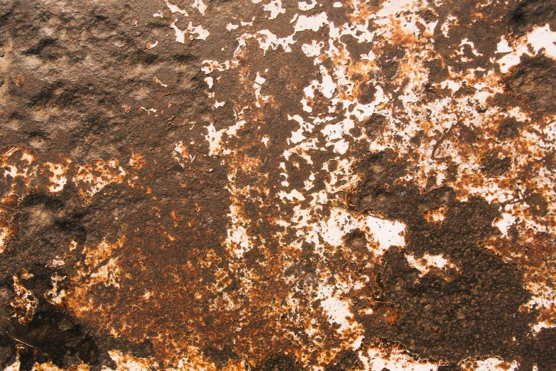 a rusted metal surface that looks like soing out of a film