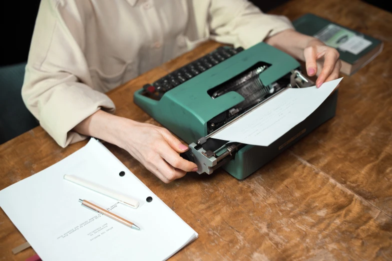 woman is  a piece of paper on a paper shredder