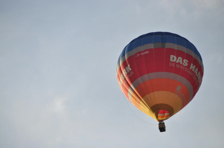a colorful  air balloon soaring through the air