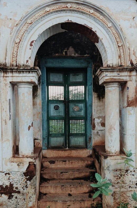 a door that is open next to some steps