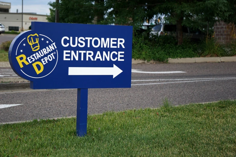 a sign pointing in different directions on a road