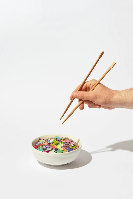 two sticks sticking into some kind of colorful cereal