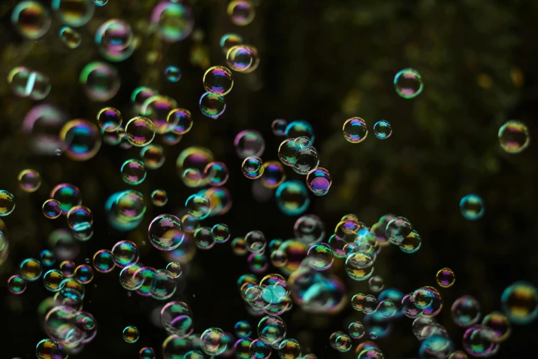 a large number of bubbles floating in the air