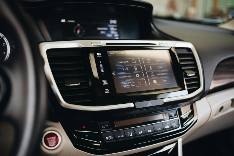 the inside view of a car with an electronic dashboard