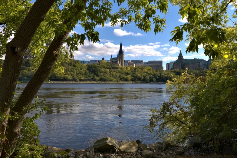 a river with a large church behind it