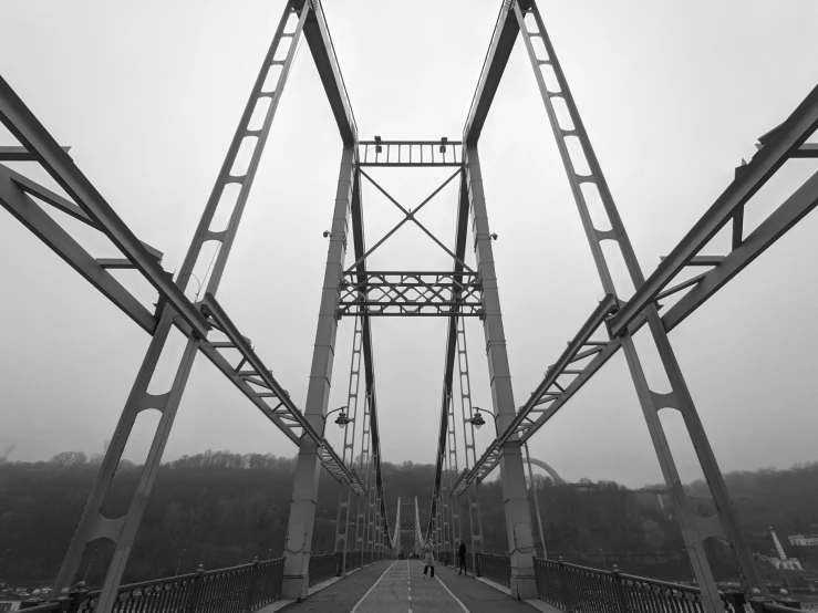 a tall metal structure next to the beach