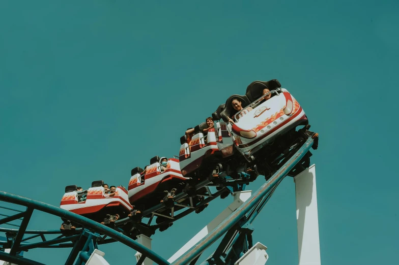 roller coaster with lots of riders on it