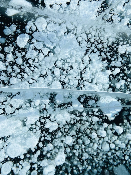 view from airplane looking up at the sky covered in ice