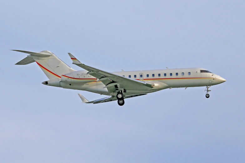 a plane flying through the air on a clear day