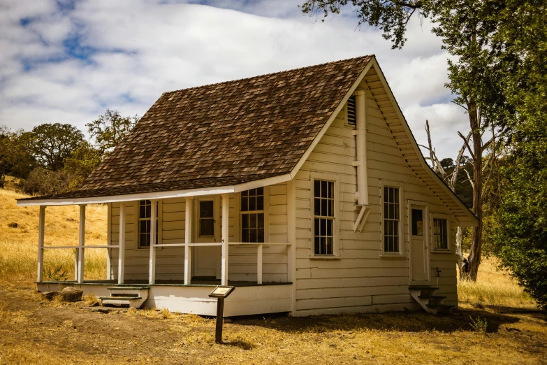 this small house has two stories on the roof