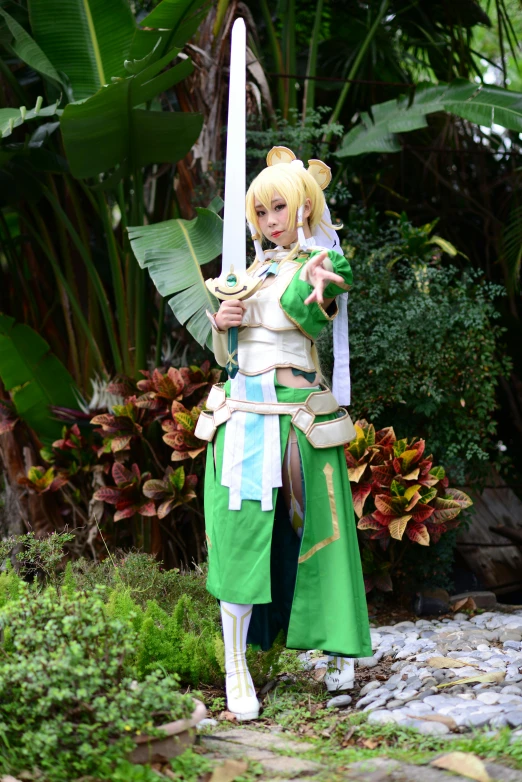 female character dressed as princess zelda holding a pole