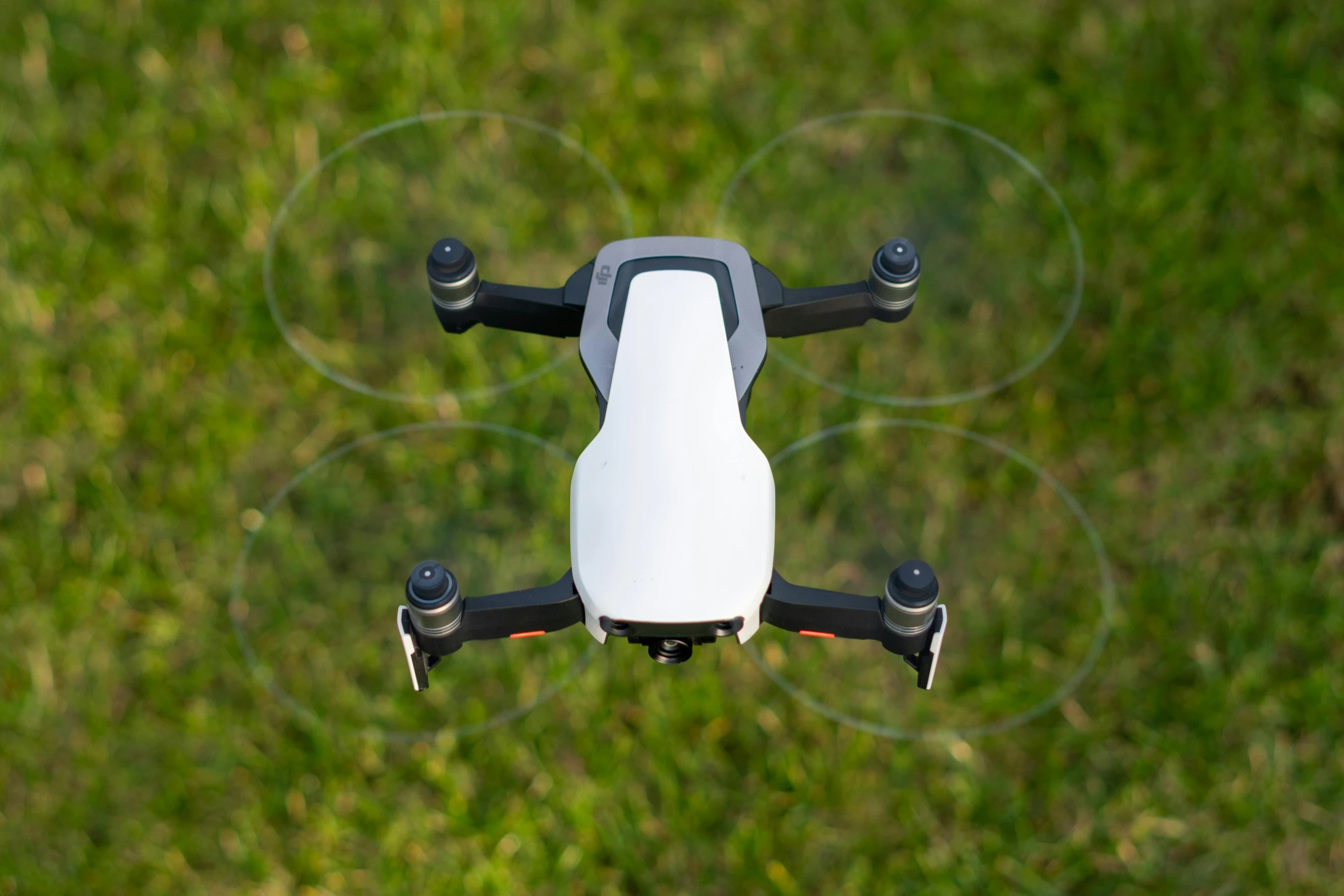 a remote control quadcopter flying through the air