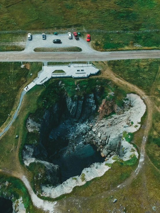 aerial view of car parking area at a bridge