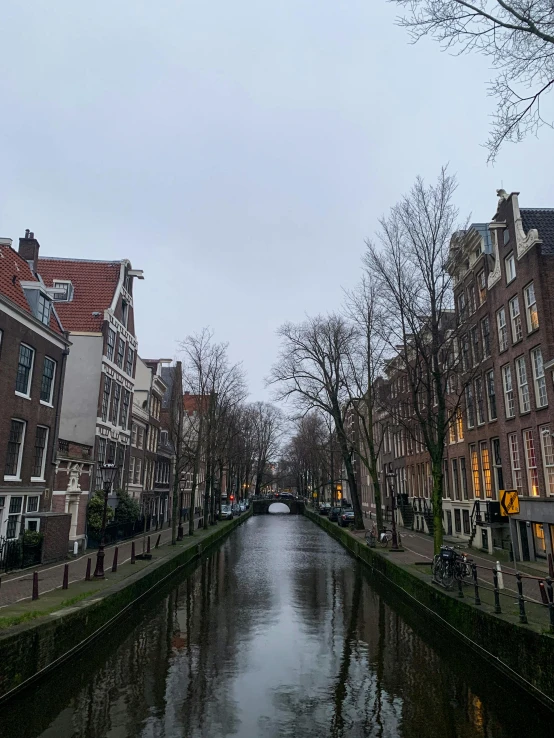 the view of an old canal in a town