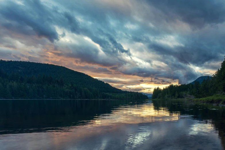 a beautiful view of the lake at sunset