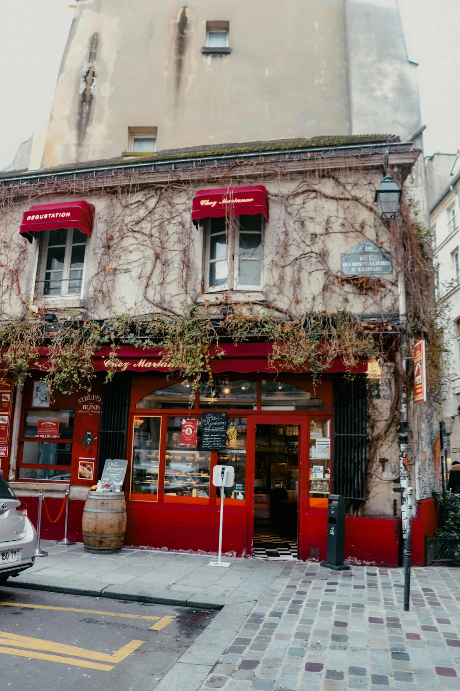 a very old building in the middle of the street