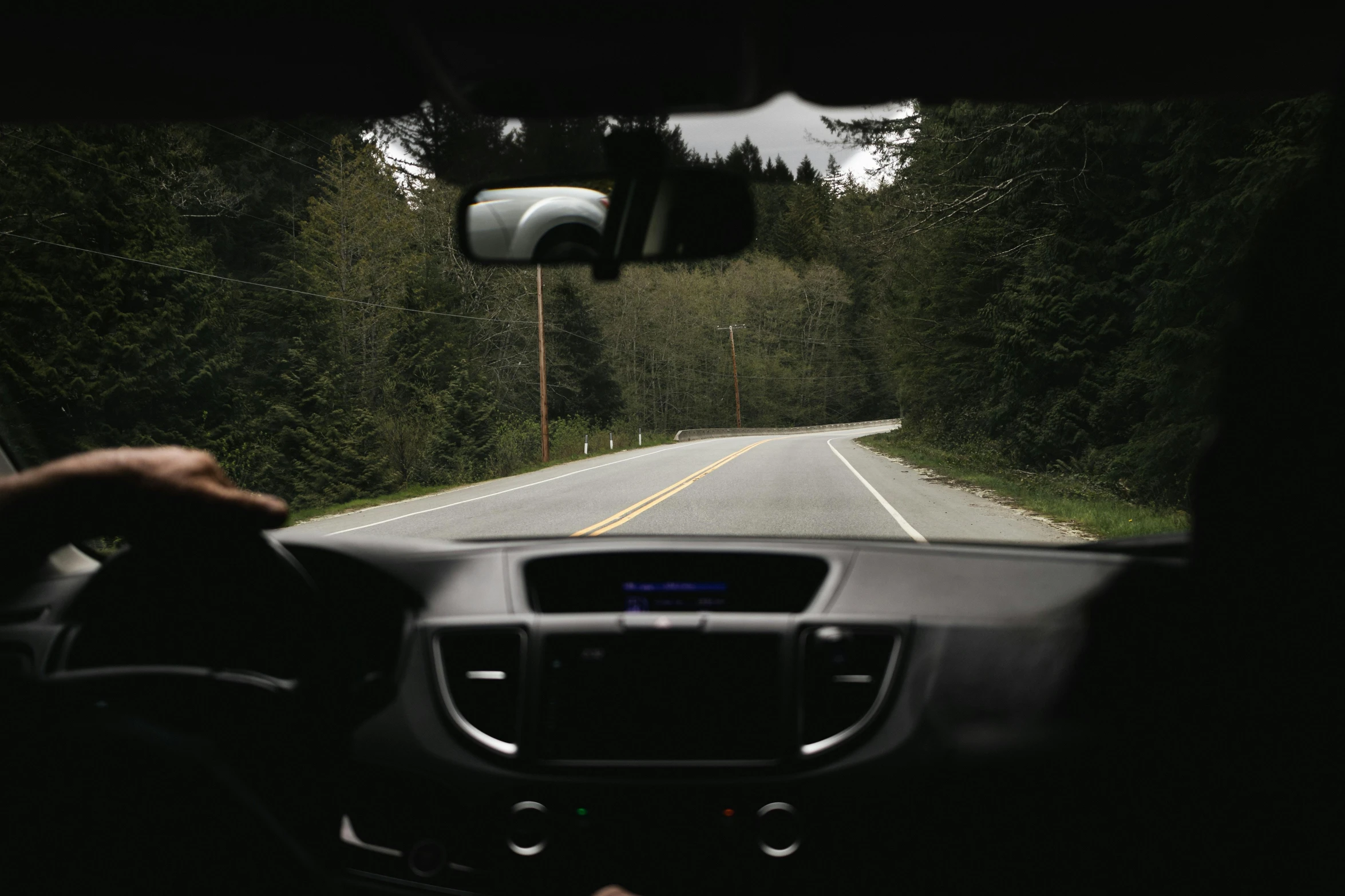 a po taken from the front seat of a vehicle looking out the window