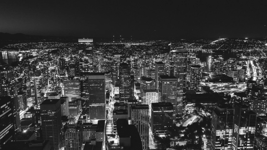 a black and white po of the city at night