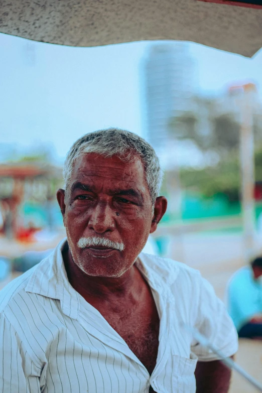 an older man has a mustache and moustache