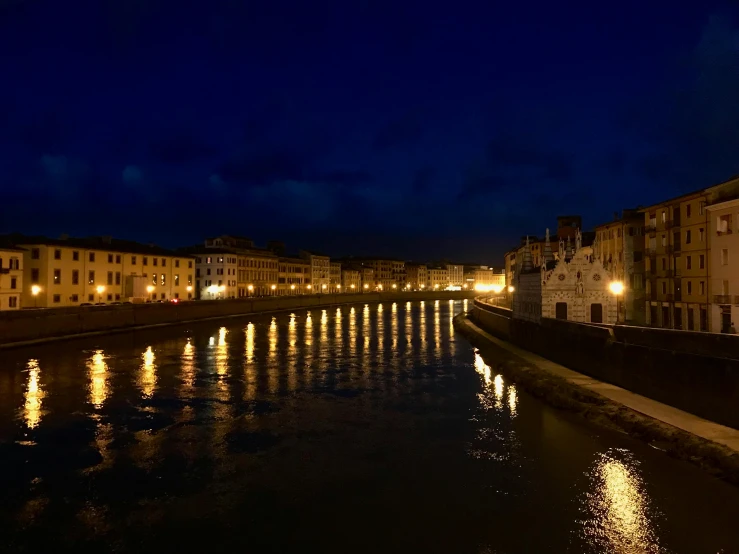 a large body of water next to buildings