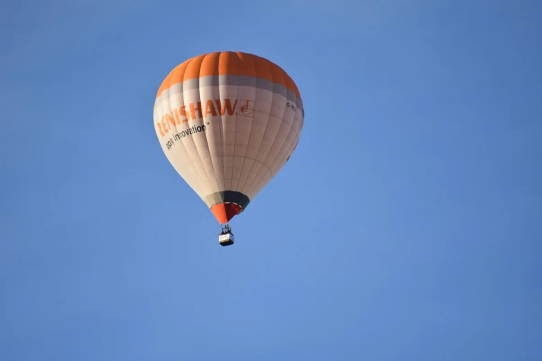 a large  air balloon with a sign on it