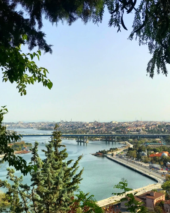 a city view with a bridge across the water