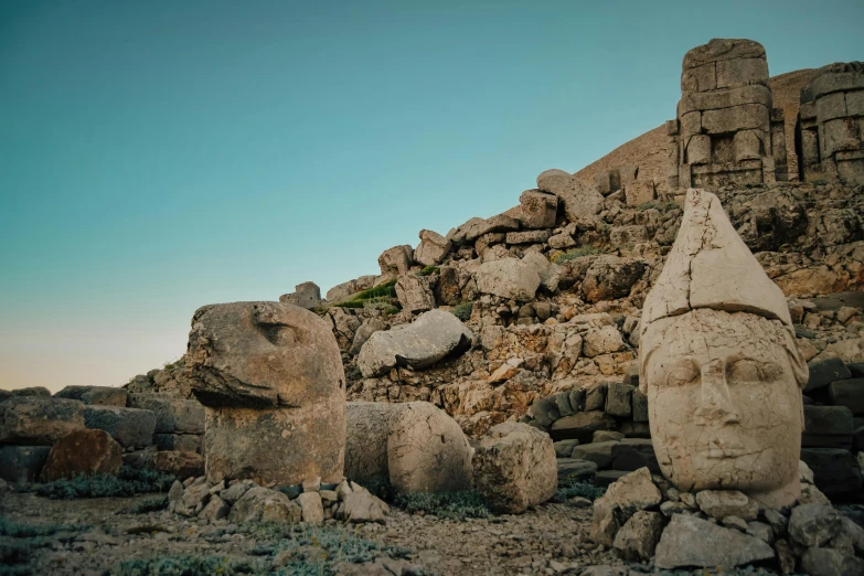 an ancient temple that looks like a face on top of some rocks