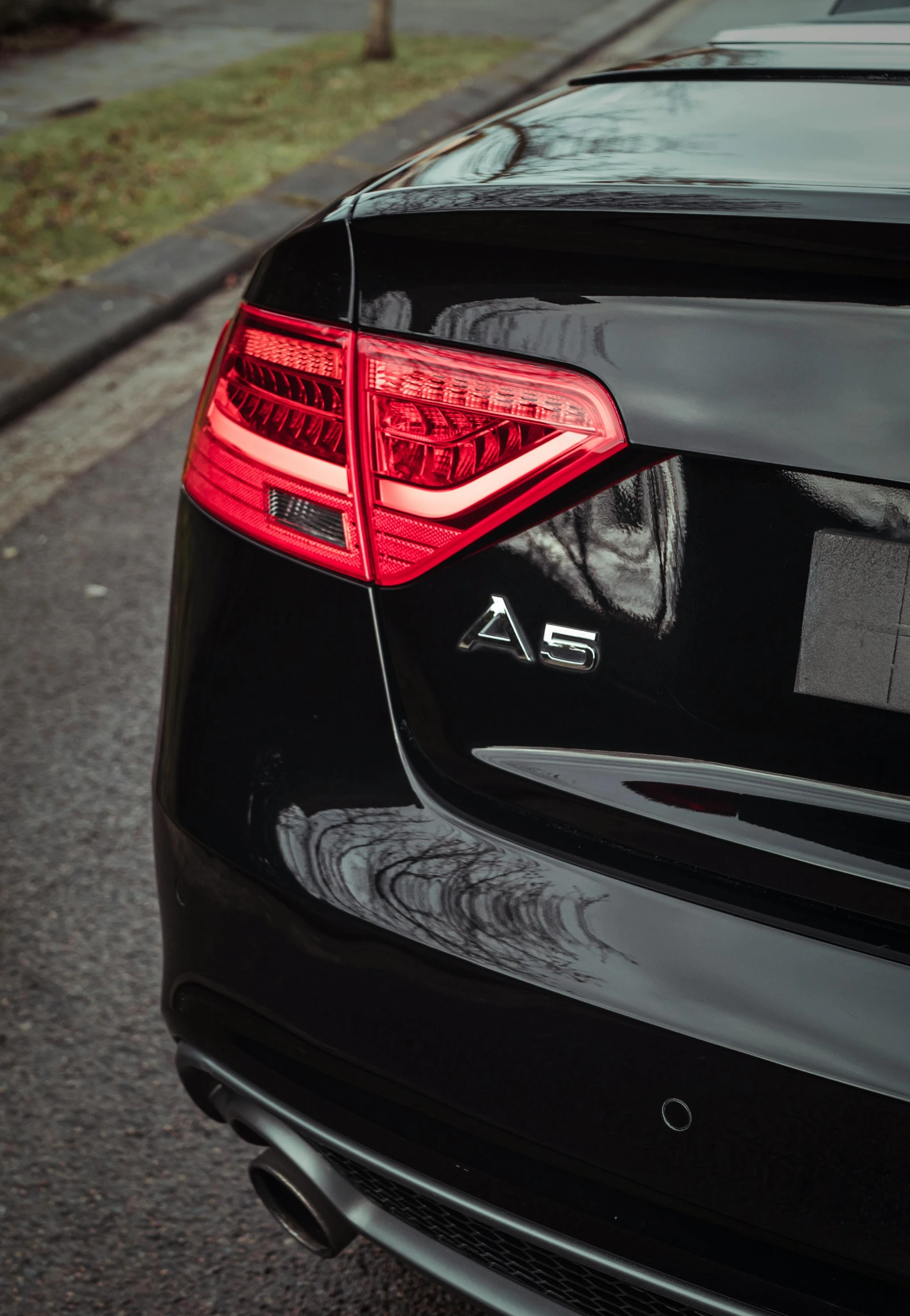 a close up view of the back light of an audi car