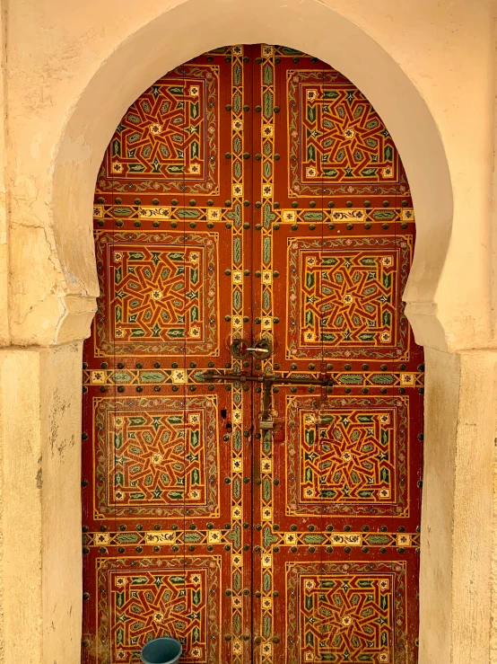 there is a large door with decorative designs on it