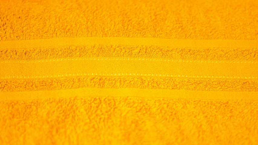 a yellow towel that is slightly textured