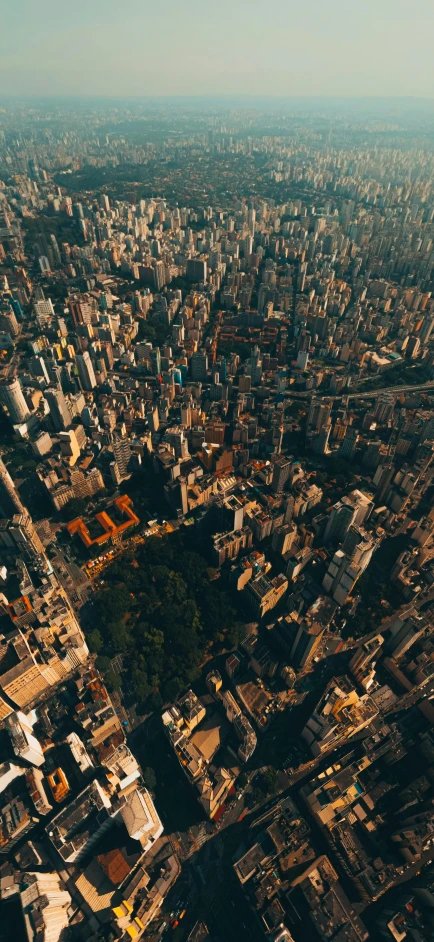 an aerial s of a large city with lots of tall buildings