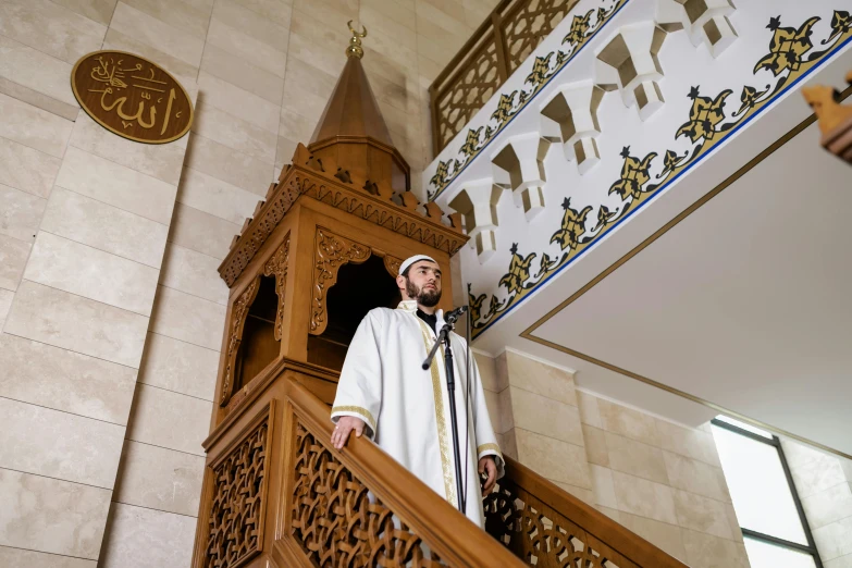 there is a priest on the stairway of this building