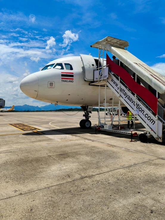 a large passenger plane on an airport tarmac