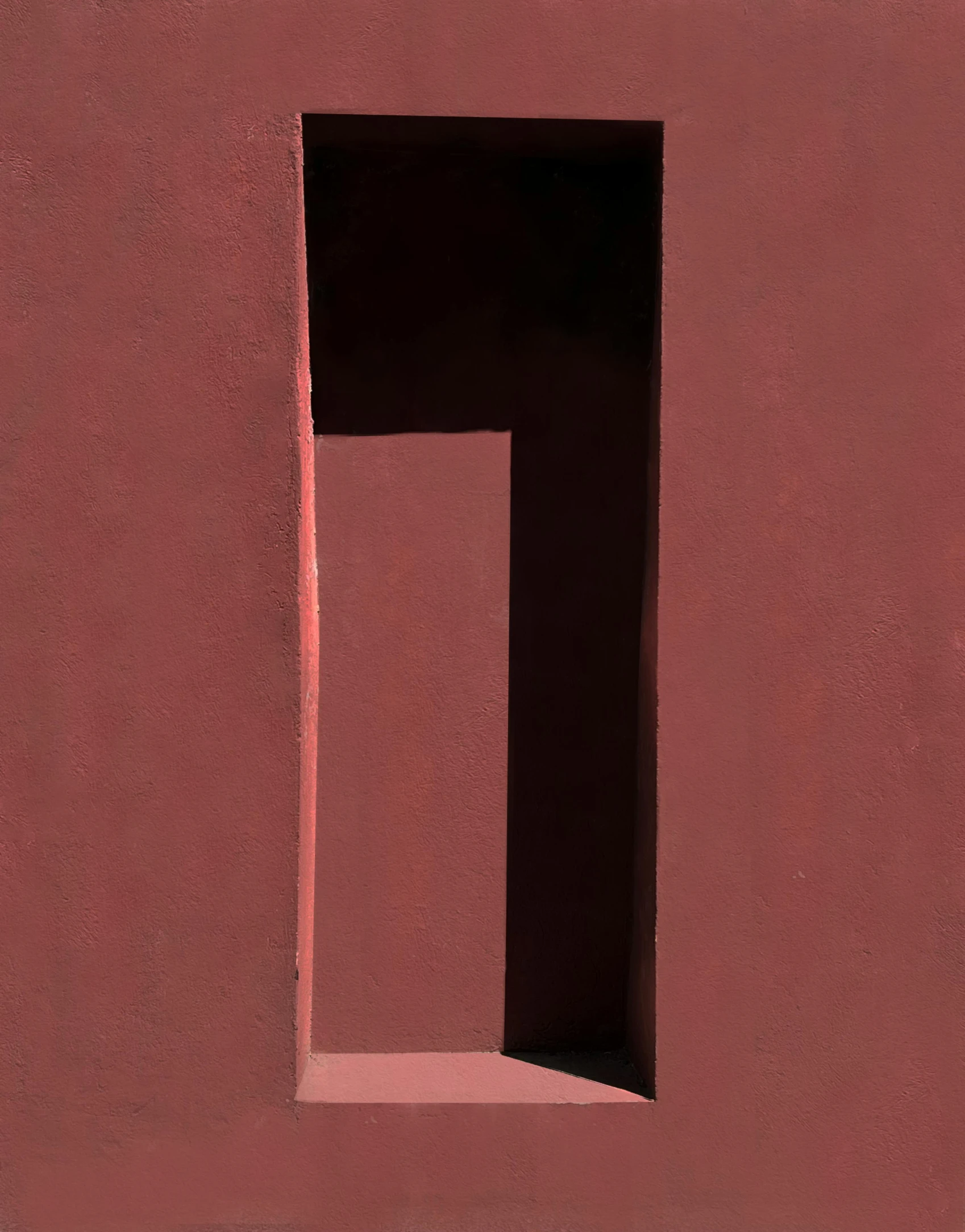 a red wall has a square window between the two sides