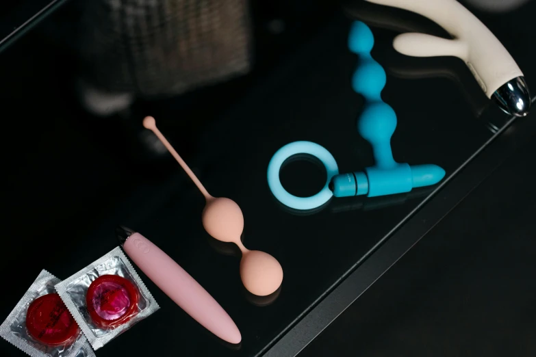 three items are displayed on a glass table