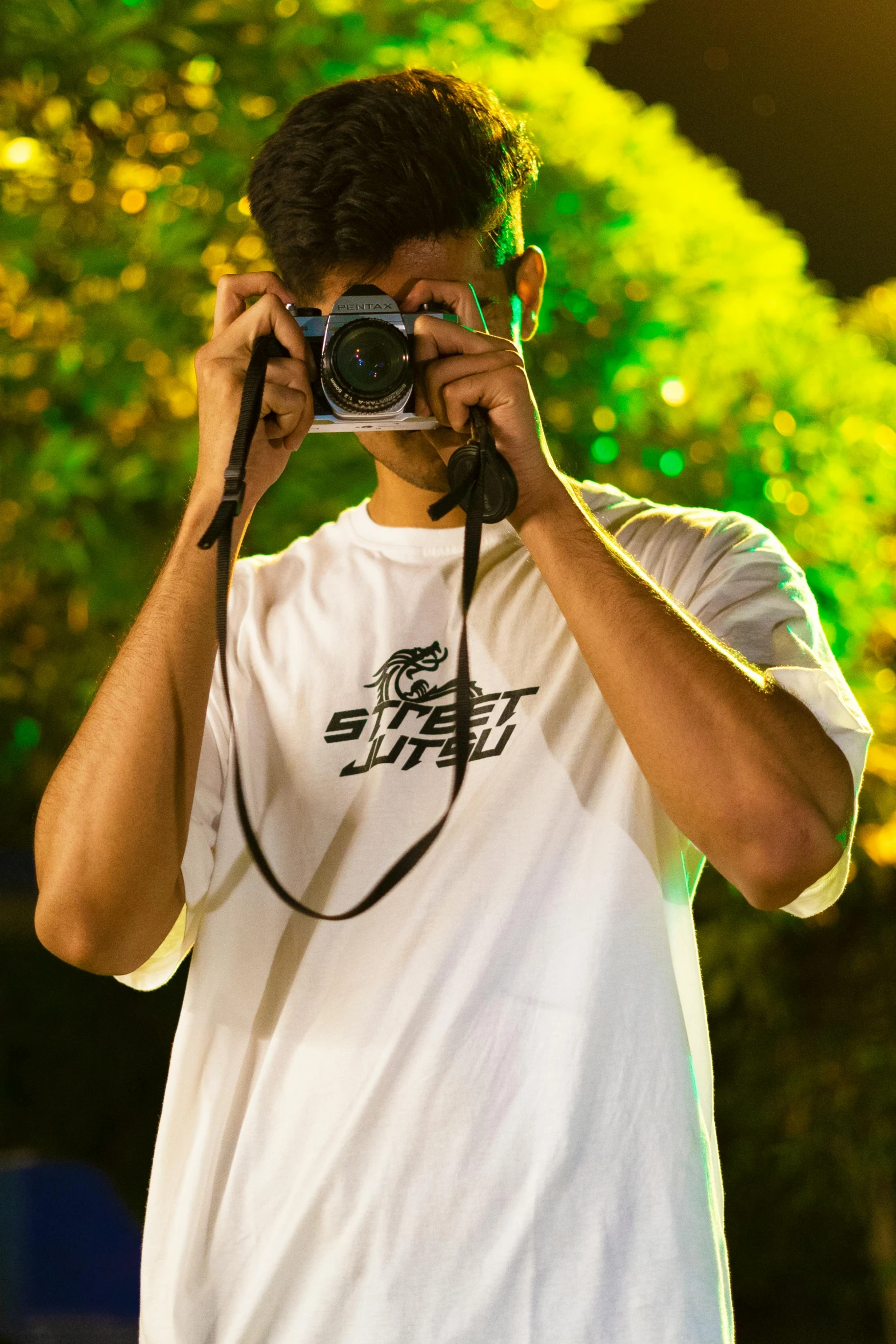 a man taking a pograph with a camera