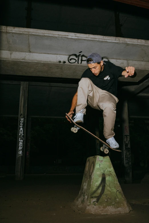 a skateboarder is jumping off the edge of a ramp