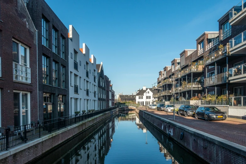 a boat parked in the water between buildings