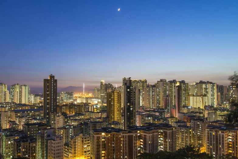 view of a large city night from an apartment building