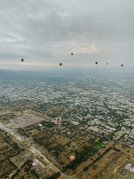 there are many  air balloons being flown