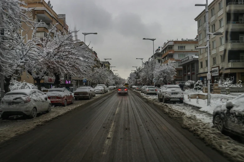 snowy streets are shown in the city with snow all over them