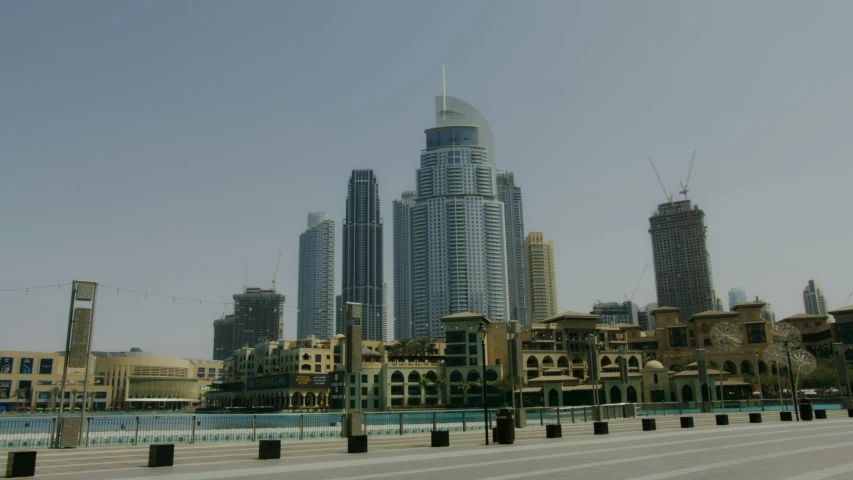 a large city with tall buildings towering over it