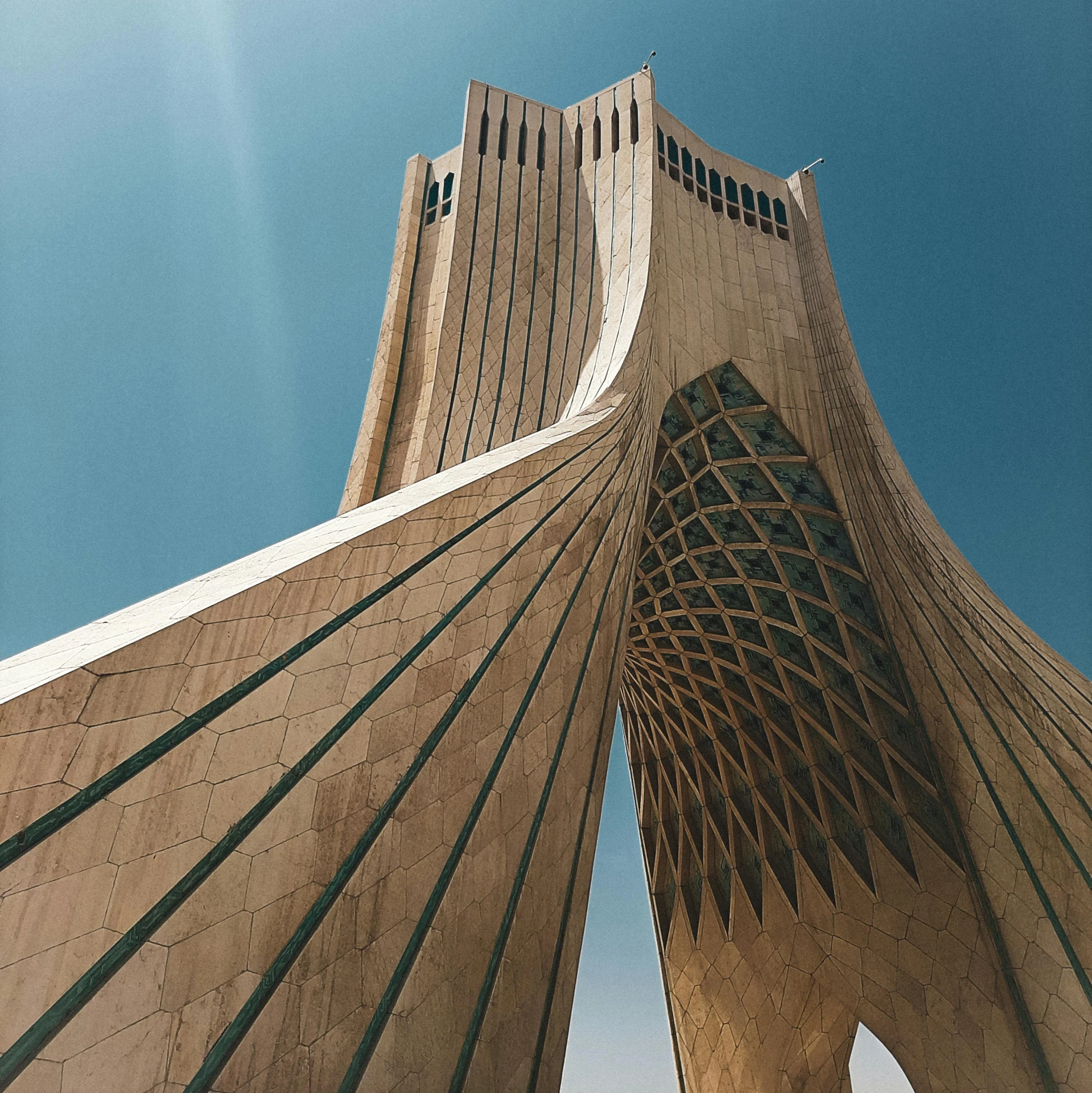 the top of a tall structure on a sunny day