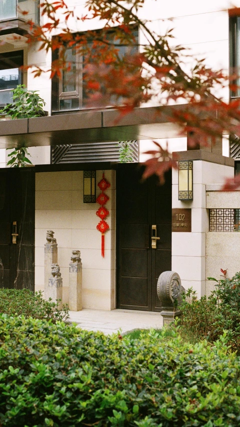 the red ribbons are on the doors of this building