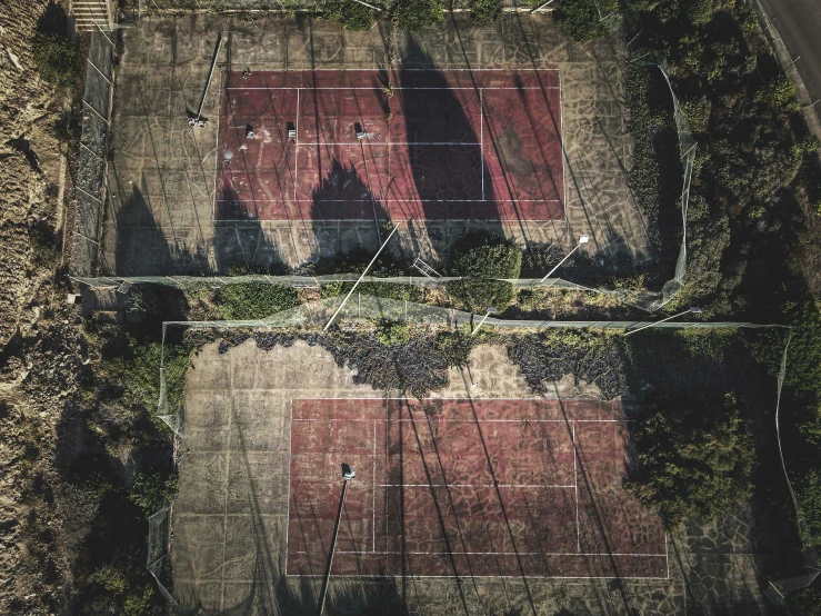 a large tennis court in a city park