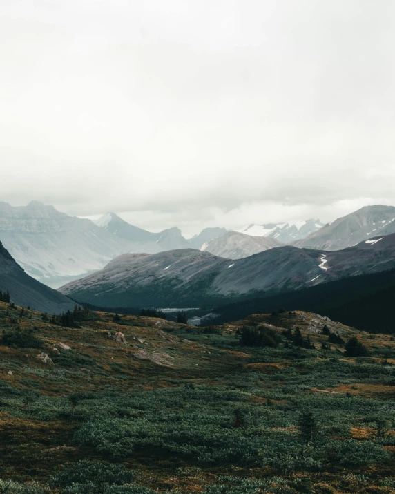 a small boat floating in the middle of a valley