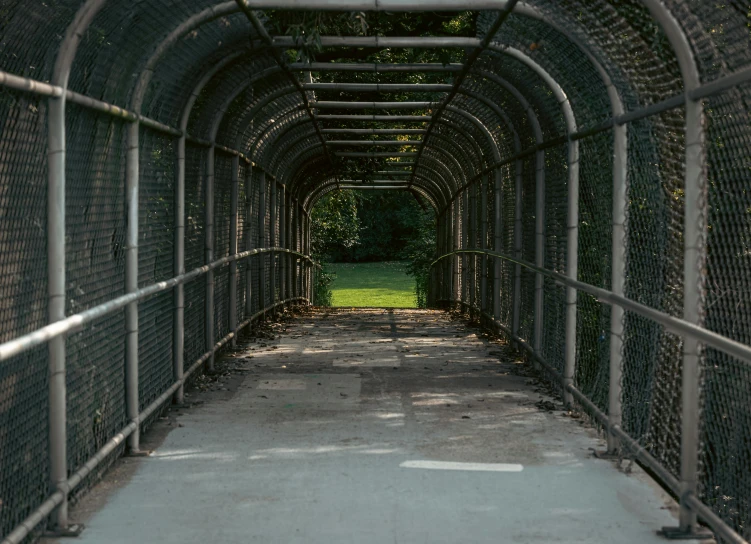 there is a walkway that goes into a park