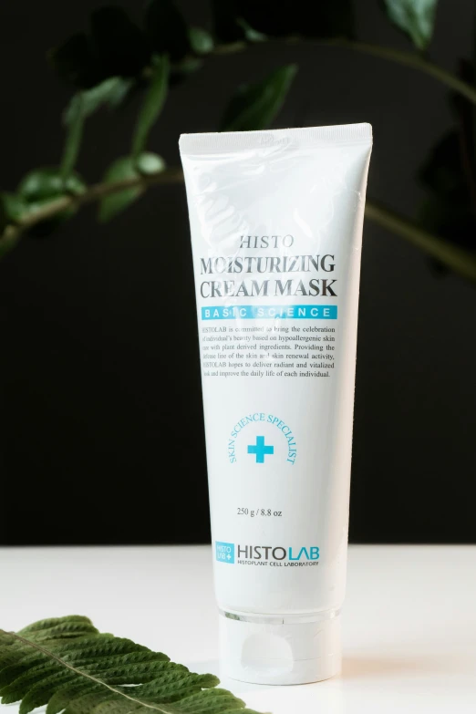 a tube of the hydstoal moist moist mask next to leaves